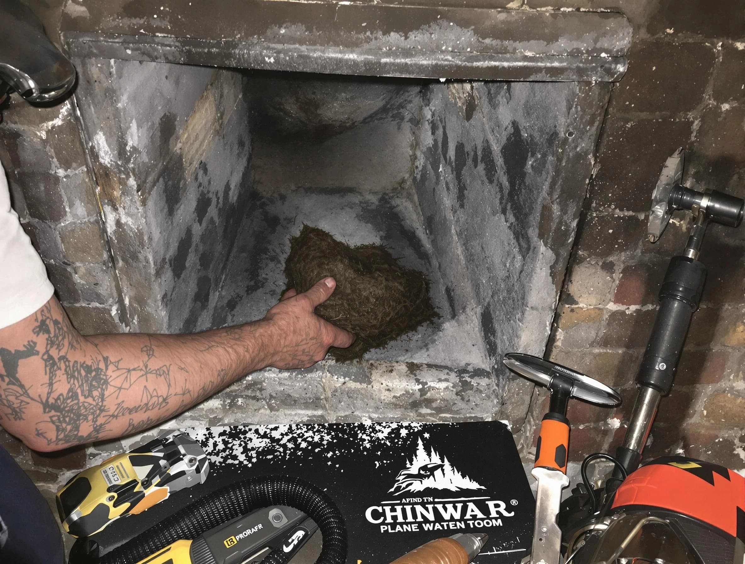 Teaneck Chimney Sweep safely removing debris and screening chimney in Teaneck, NJ