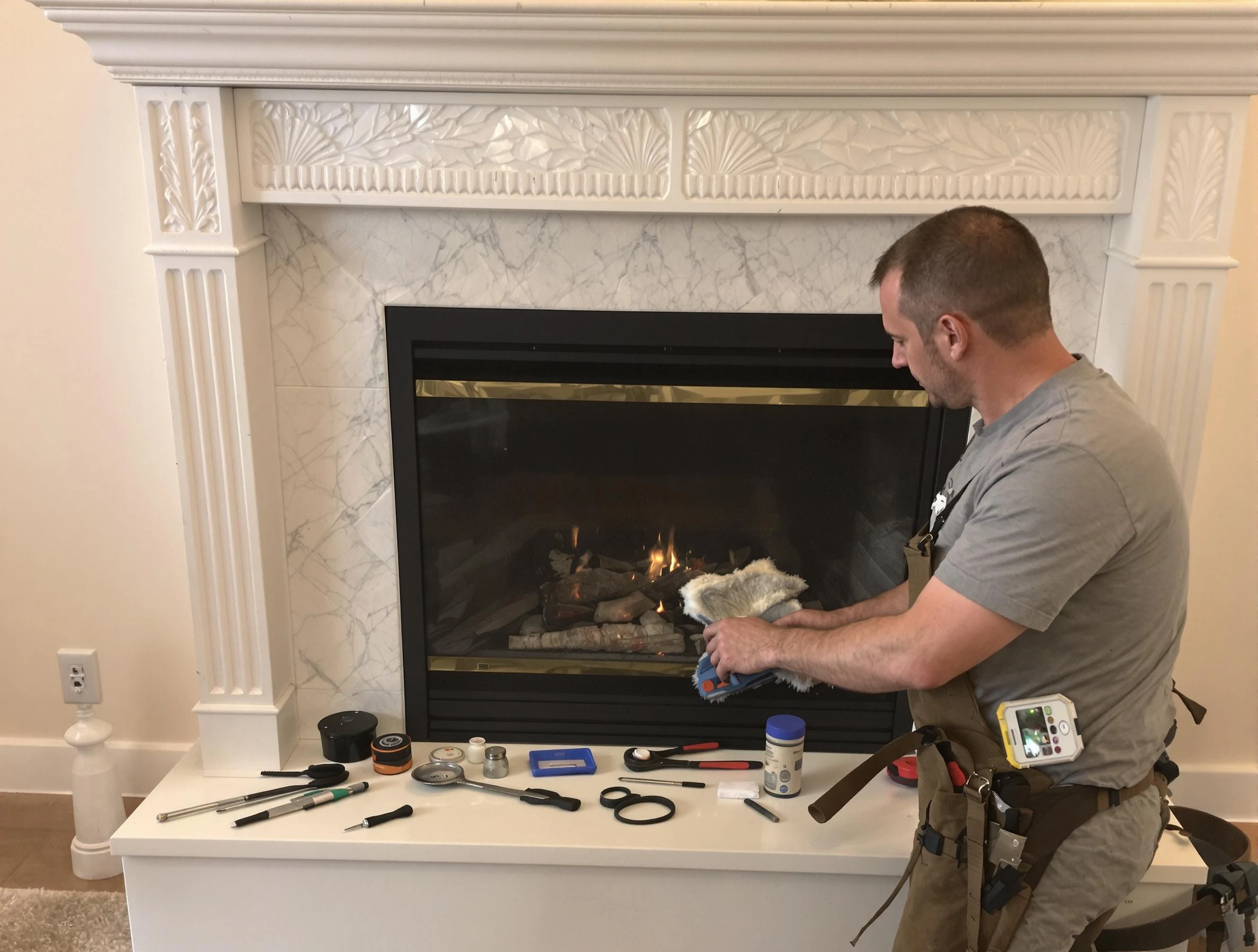 Teaneck Chimney Sweep performing fireplace maintenance in Teaneck, NJ